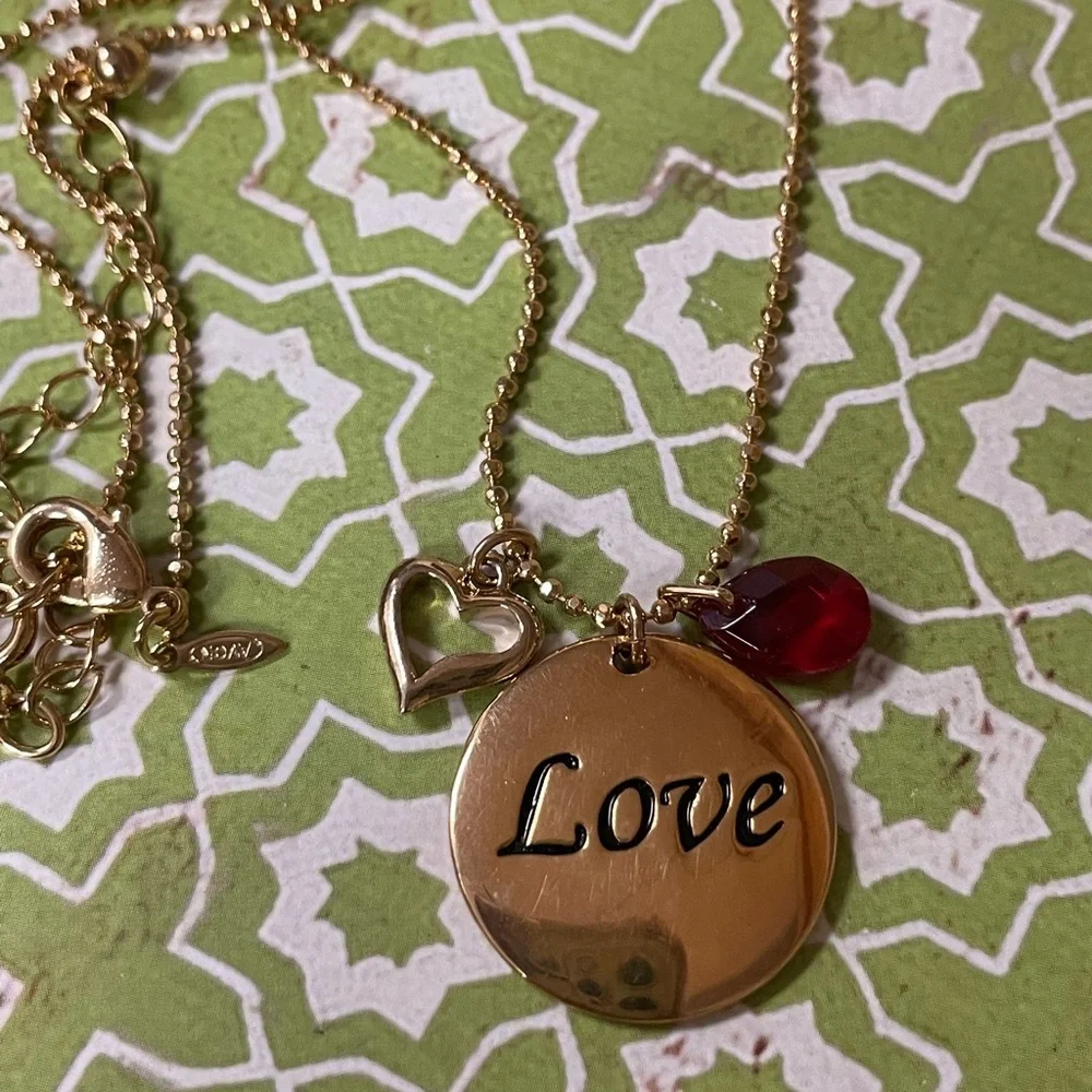 AVON “Love” Necklace – Gold Tone Pendant with Heart & Garnet Color Gem Drop